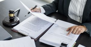 Business professional reviewing official documents before UAE submission