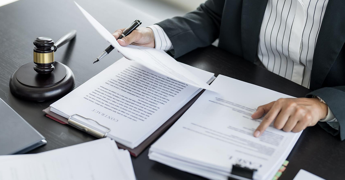 Business professional reviewing official documents before UAE submission